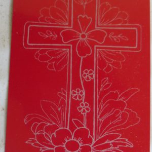 Red card engraved with cross